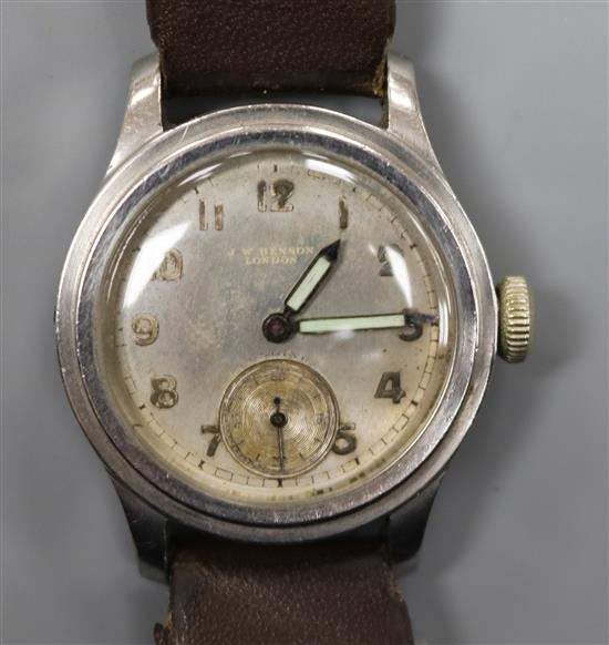 A mid 20th century stainless steel Longines mid size? manual wind wrist watch retailed by J.W. Benson,